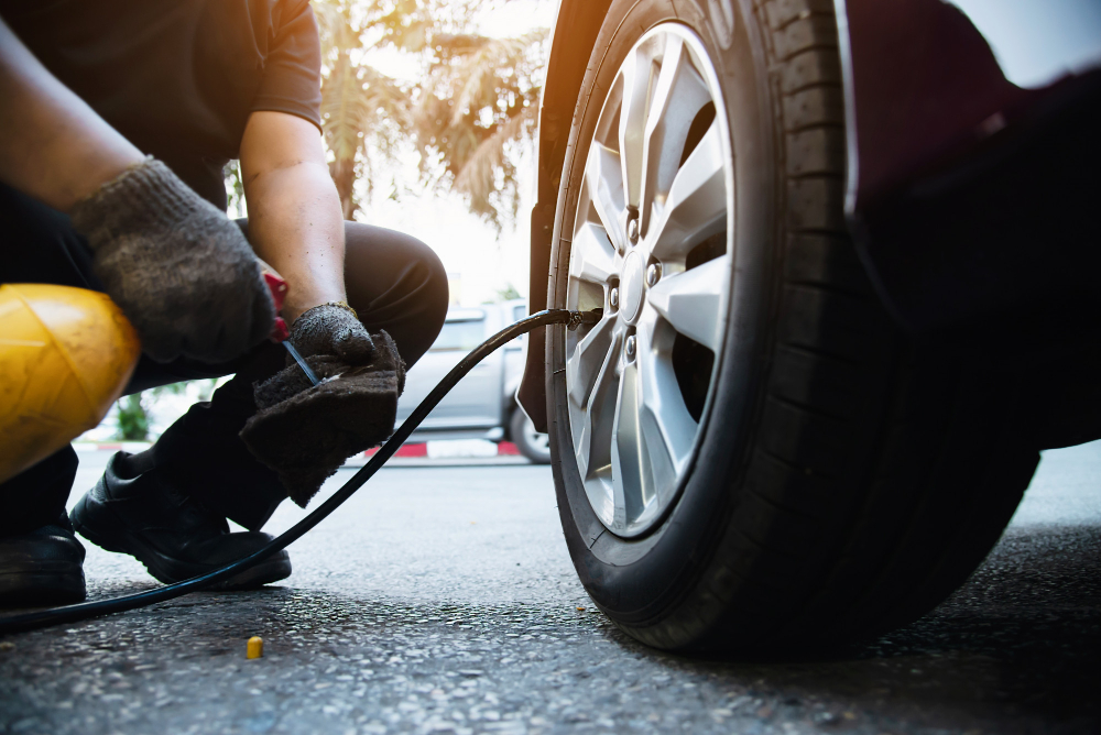 Tyre pressure being checked