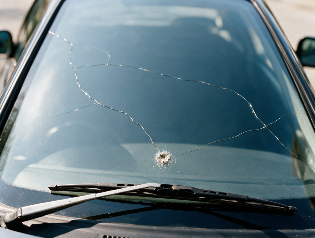 Long crack across a car windscreen